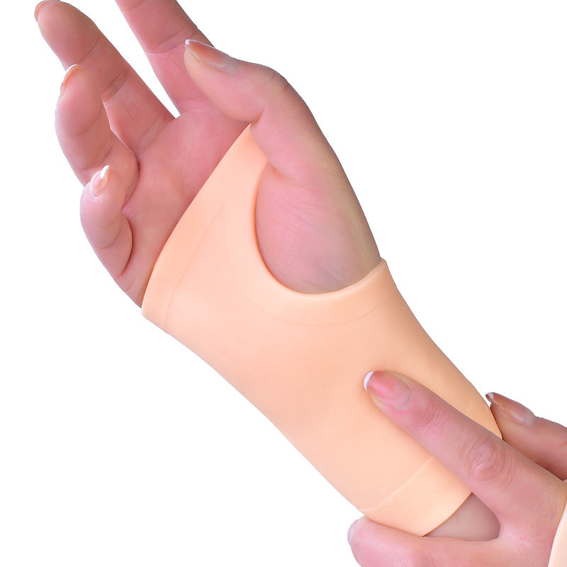 Gel wrist brace shown on person typing, model L/XL